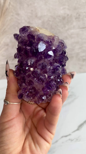 Amethyst on Calcite crystal, video